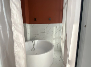 Квартира Стильная студия в центре с круглой ванной