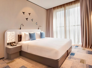 Отель Lemon Tree Hotel Jumeirah Dubai