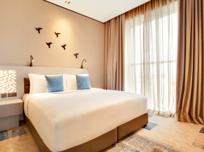 Отель Lemon Tree Hotel Jumeirah Dubai