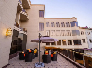 Отель Dilimah Premium Luxury