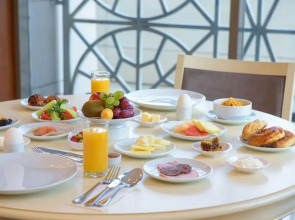 The Grand Gloria Отель