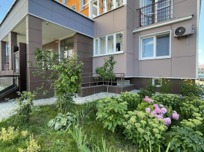 V Tsentre Goroda Apartments