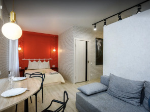 Квартира Студия с большой круглой ванной и камином