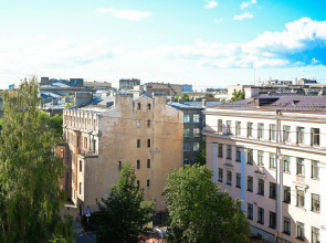 Апартаменты  1912 с видом на крыши Петроградки и Телебашню