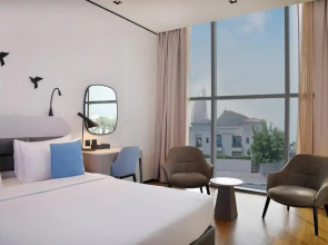 Отель Lemon Tree Hotel Jumeirah Dubai