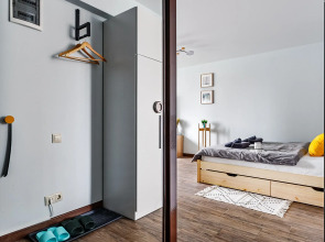 Апартаменты Butyrsky Cozy with Terrace, Parking and King-size Bed