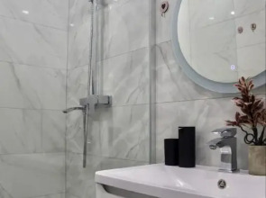 Квартира Flatirini с панорамными окнами в новом ЖК 1