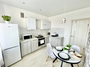 Апартаменты Светлые на Фомушина с Видом на Парк