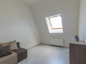 Апартаменты Двухкомнатная Квартира на Мансардном Этаже