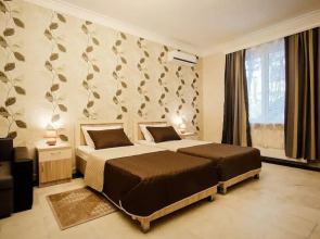 Отель Toma's House