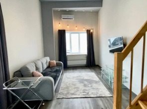 Квартира Просторная студия в центральной части города