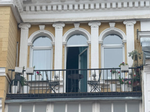 Квартира Уютный Лофт с балконом на главной улице Столицы Закатов