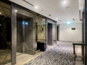 Апартаменты Stylish 1BR at Damac Merano Tower with Great View