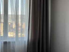 Апартаменты "Эленика" Двухкомнатая квартира в Махачкале с видом на озеро и мечеть