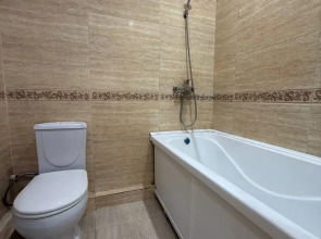 Апартаменты Светлые с балконом и стильной гостиной на Магомедали Магомеджанова