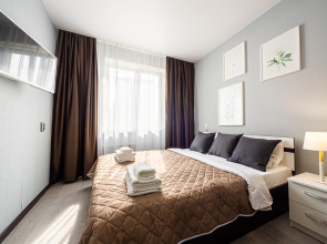 Chistyj Vzgljad na Alekseeva 109 rjadom s TRC Planeta Apartments