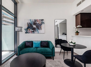 Апартаменты Stylish 1BR at Damac Merano Tower with Great View