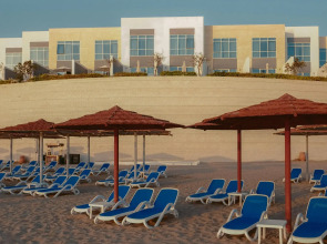 Курортный отель Royal M Al Aqah Beach Resort by Gewan