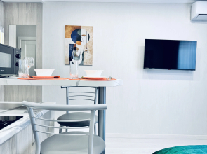 Апартаменты Уютная студия с дизайнерским ремонтом