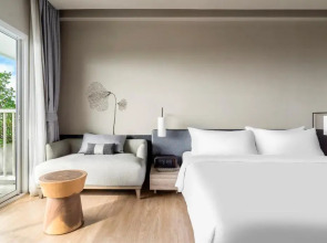 Отель Cross Pattaya Pratamnak