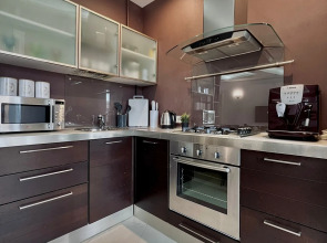 Апартаменты Уютная двухкомнатная квартира рядом с ЦУМом