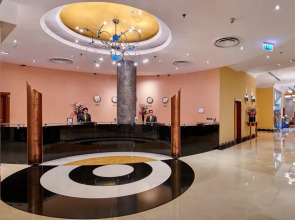 Отель Millennium Airport Hotel Dubai