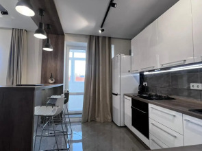 Апартаменты Стильная студия на побережье