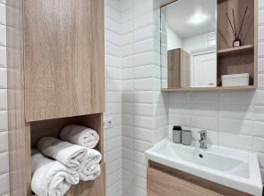 Апартаменты Уютная Студия на Вольной