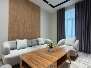 V Tsentre Goroda Apartments