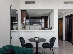 Апартаменты Stylish 1BR at Damac Merano Tower with Great View