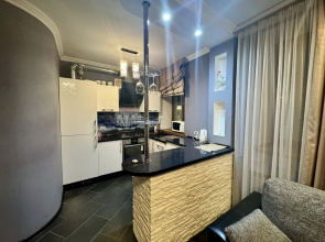 V Tsentre Goroda Flat