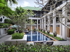 Отель OUTRIGGER Surin Beach Resort