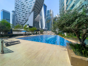 Апартаменты Stylish 1BR at Damac Merano Tower with Great View