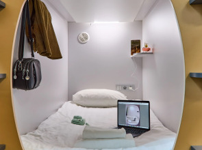 Капсульный отель Оранжевое Небо