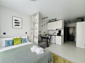 Апартаменты Unique Apart Олива видовая квартира в элитном ЖК рядом с Кассационным судом и Мариинским театром на Мичурина 58/2