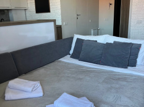 Апартаменты Стильная студия на побережье