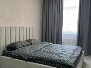 Na Ulitse Kommunisticheskoy, 9 Flat