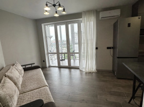 Квартира Современная уютная квартира рядом с Мамаевым Курганом