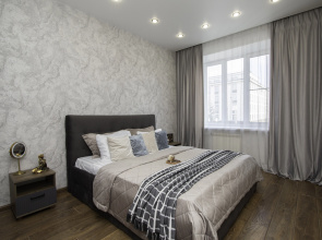 V Tsentre Goroda Apartments