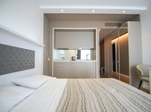 Bright Apartment with Balcony in Alliance Palace Batumi - Steps from the Sea & Dancing Fountains Apartments