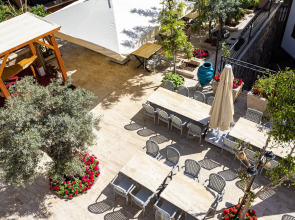 Отель WOO Town Suites