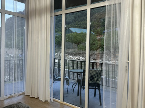 Апартаменты Панорамный дом среди вершин