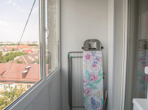 Апартаменты с видом на закат и крыши