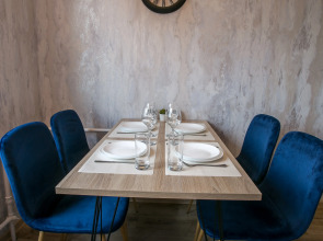 Апартаменты с видом на закат и крыши