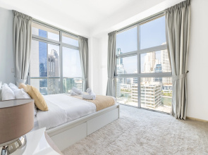 Luxe Waterfront 3BR with Marina View at DEC Apartments