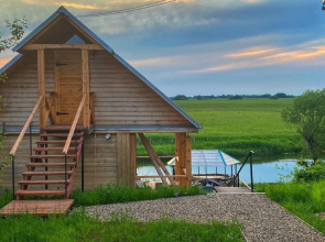 U Reki Kamenka Private house
