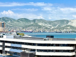 Квартира Уютная студия с потрясающим видом на море в центре