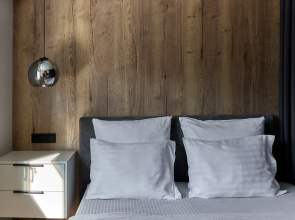 V Tsentre Goroda Apartments