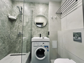 Апартаменты Unique Apart Олива видовая квартира в элитном ЖК рядом с Кассационным судом и Мариинским театром на Мичурина 58/2