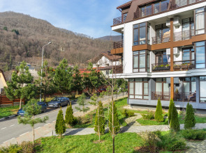 Квартира Студия с витражными окнами с видом на лес и горы